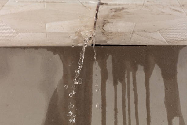 Professional Flood Damage Cleanup technician working in Silver Lake, NH